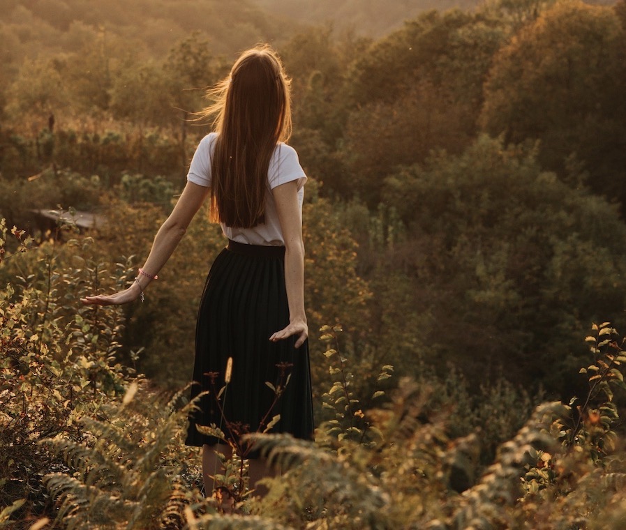 woman standing in a field